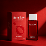 Biomella Born Bare Eau de Parfum red perfume bottle displayed next to its matching packaging