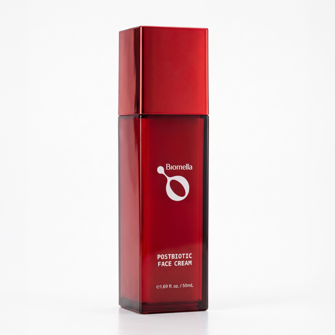 Biomella Postbiotic Face Cream red bottle on a white background
