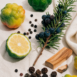 Biomella Born Bare perfume ingredients with citrus, juniper berries, rosemary and sandalwood